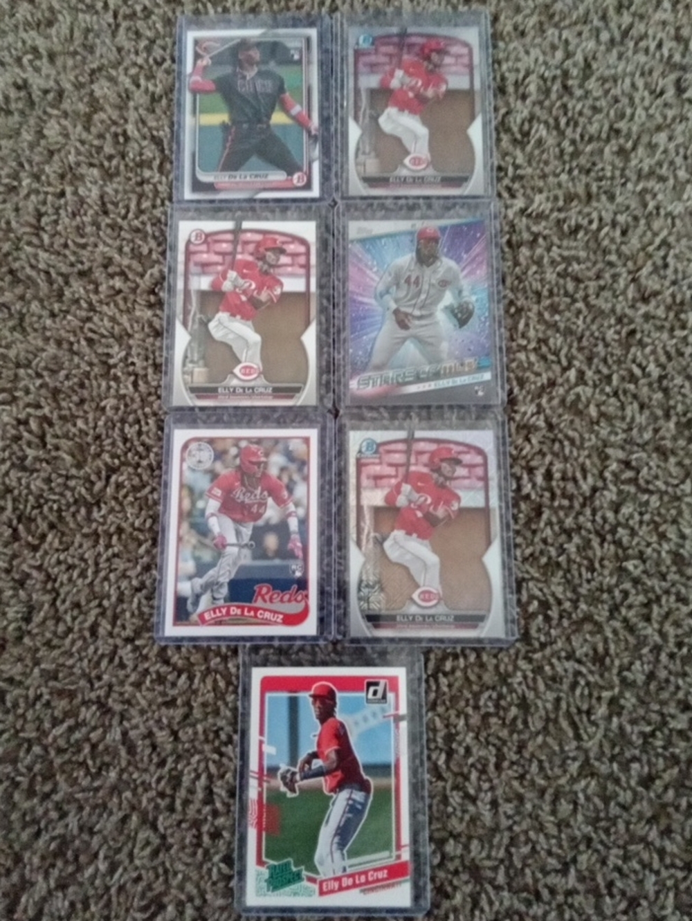 7 Card Panini Elly De La Cruz Baseball Card Set - Red and White Accents.